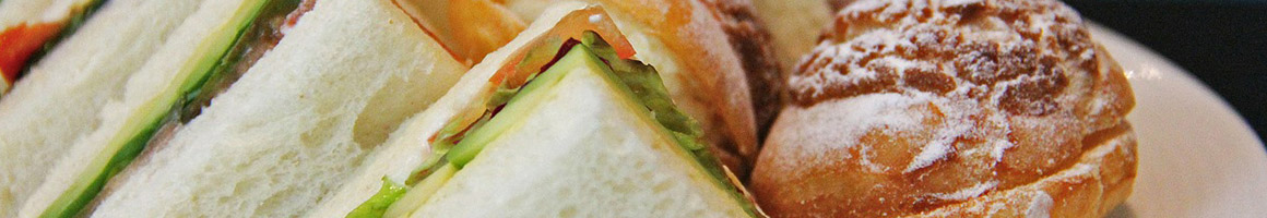 Eating American (New) Breakfast & Brunch Burger Sandwich at Saucy Focaccia restaurant in Cedar Rapids, IA.